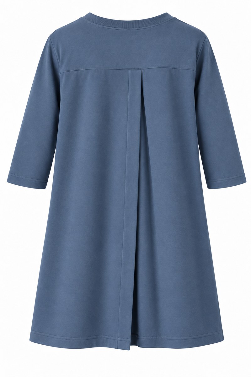 Back view of the Pigeon Blue women's 3/4 -sleeved open back care shirt showing overlapping back panels.